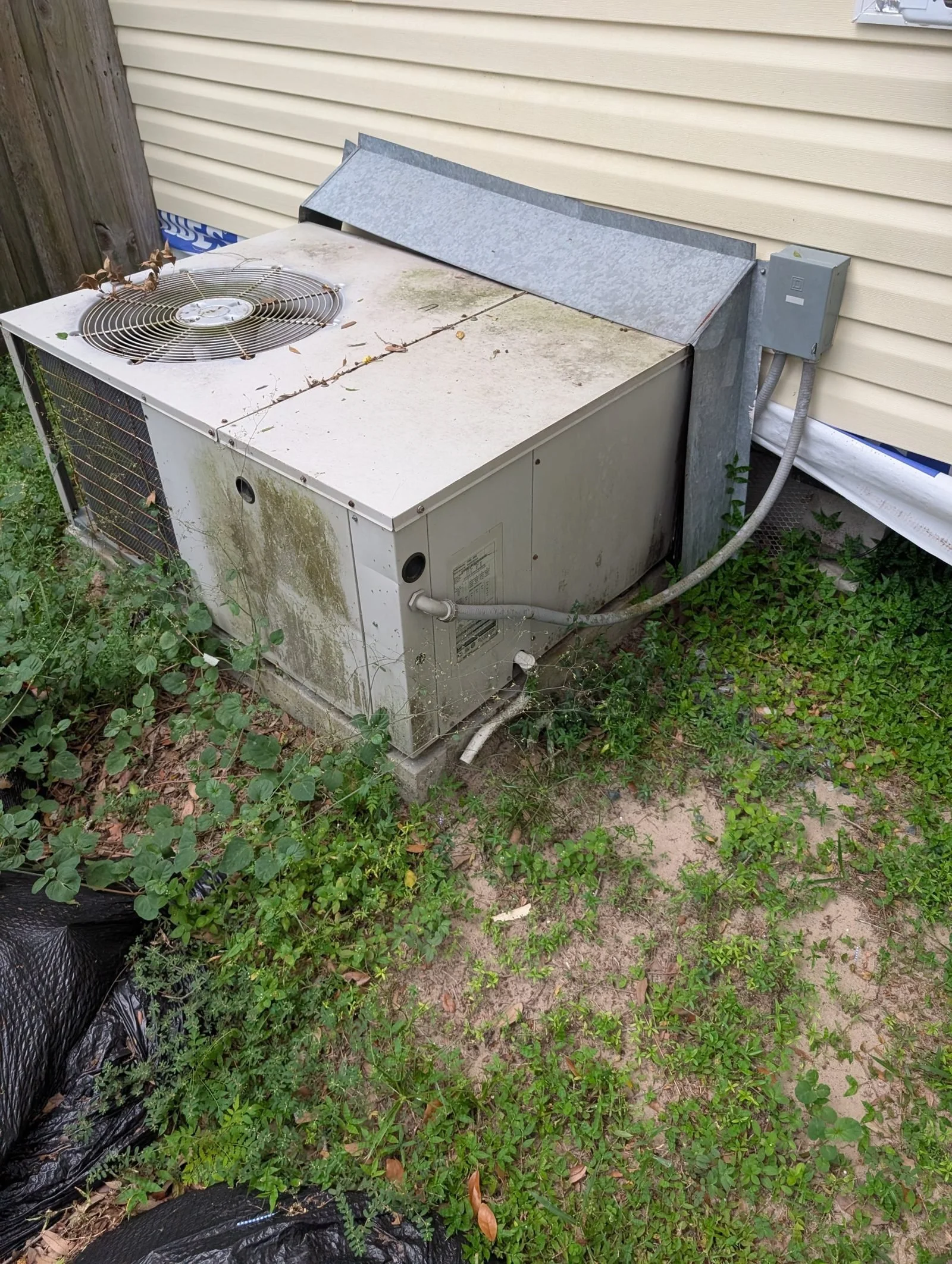 A Polk Services appliance pickup in progress at a Lakeland home.