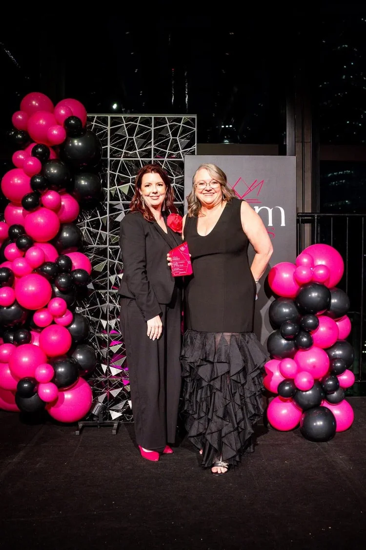 Susan on the Beam Awards stage with her Gold trophy