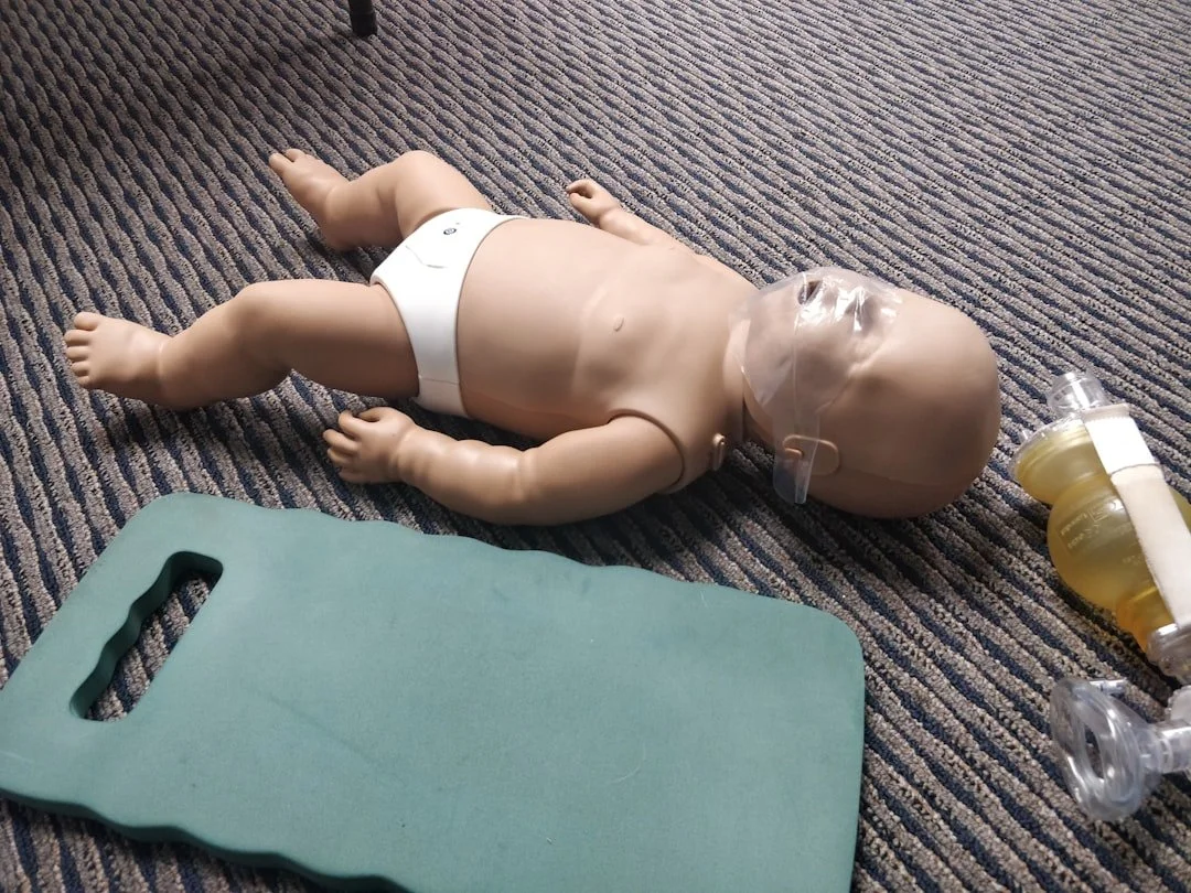 Hands-on emergency response practice during workplace CPR and First Aid training