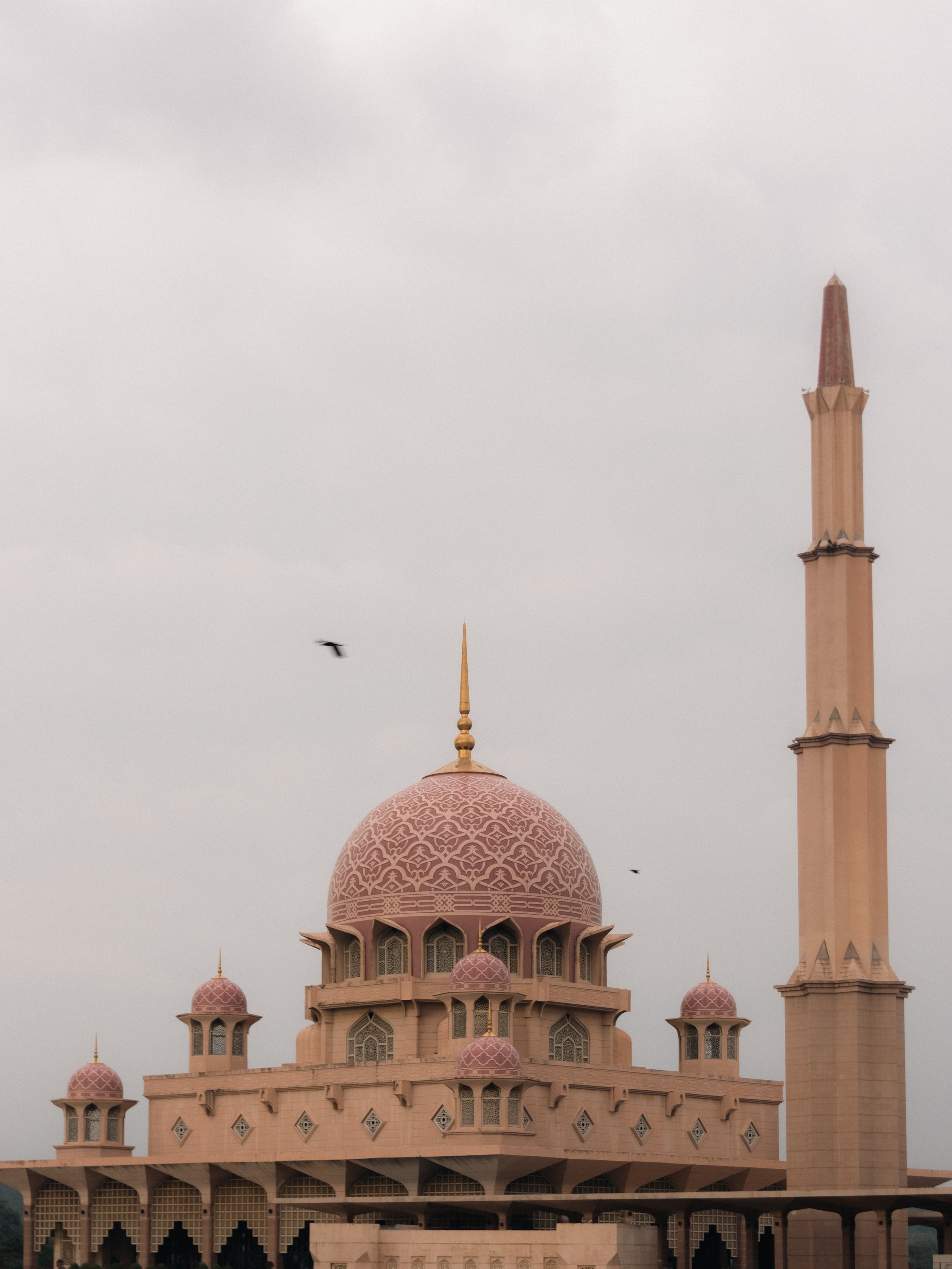 The rose-coloured dome and minaret of Putra Mosque in Putrajaya
