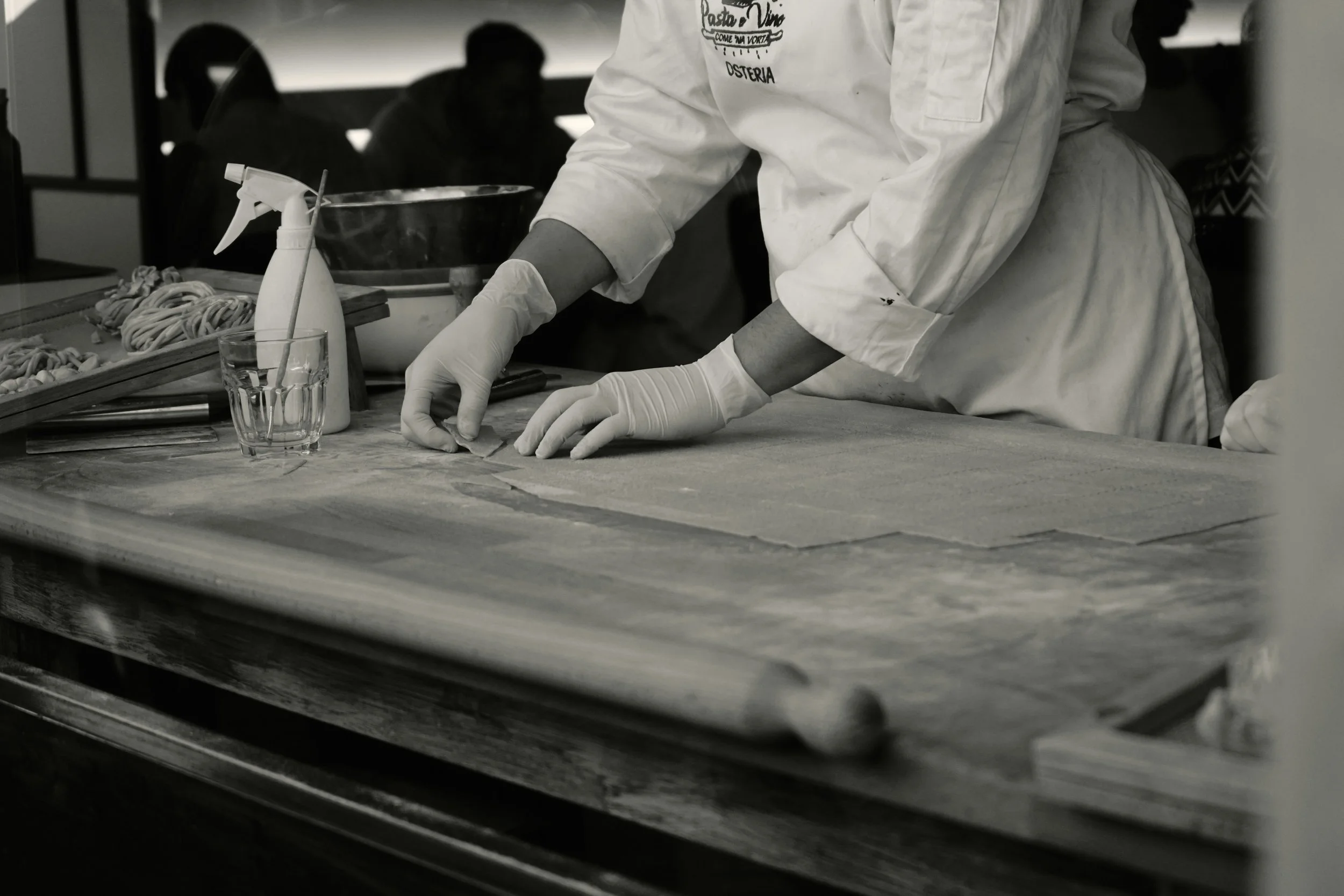 Fresh pizza and gelato being prepared