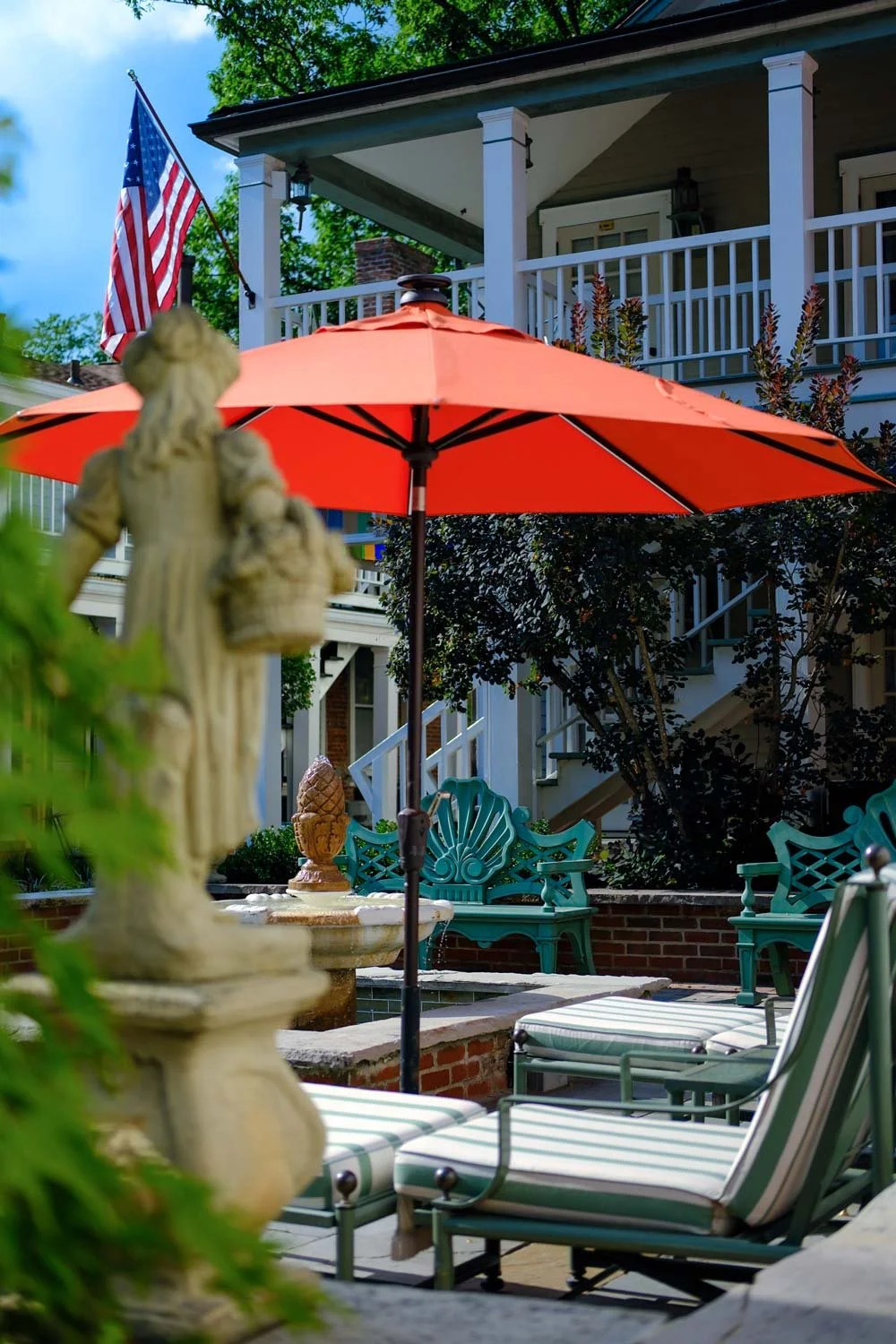 Sunny courtyard seating at The Buxton Inn.