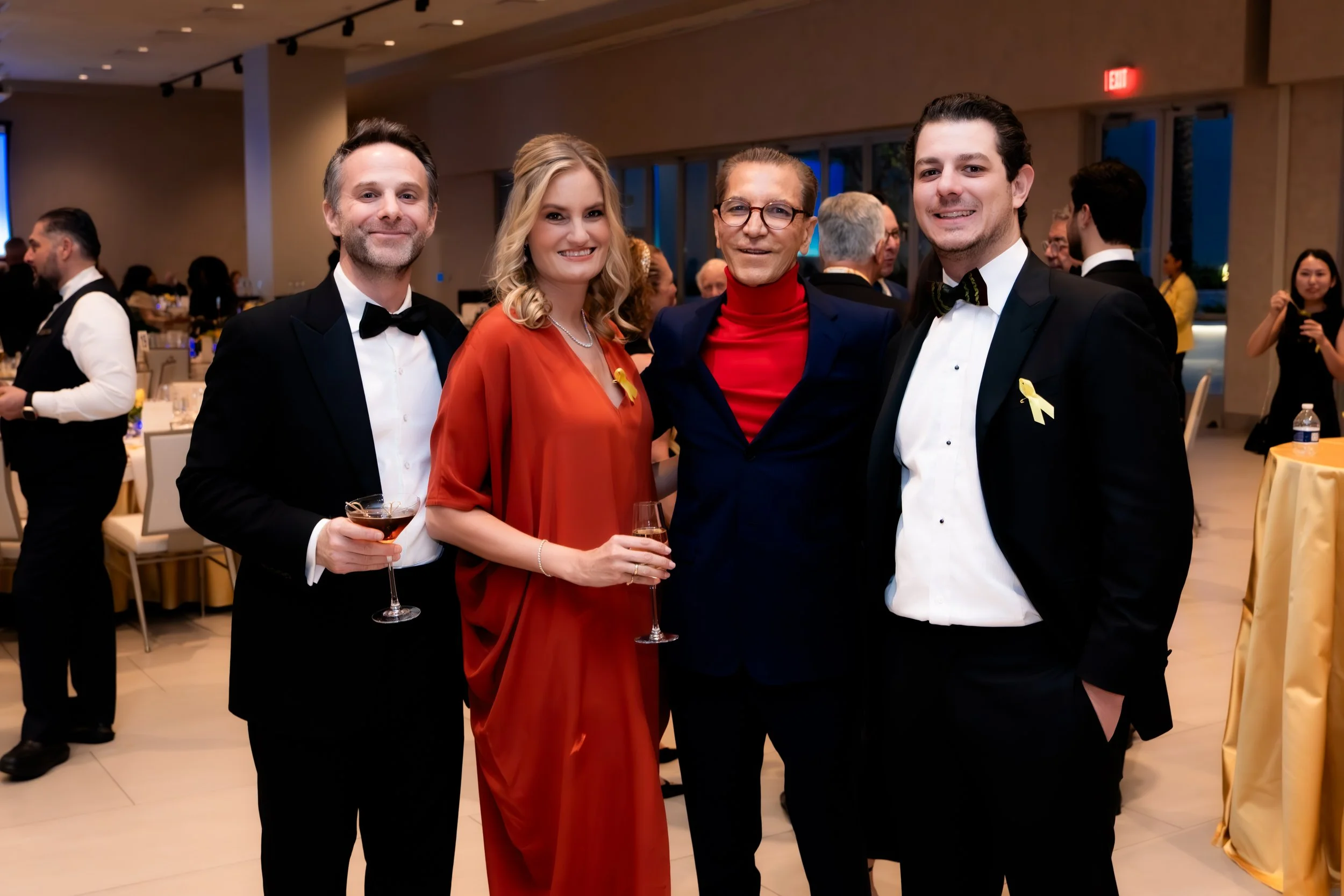 Guests toasting at the reception