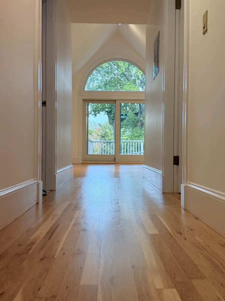 Cambridge project: hallway toward the arched window