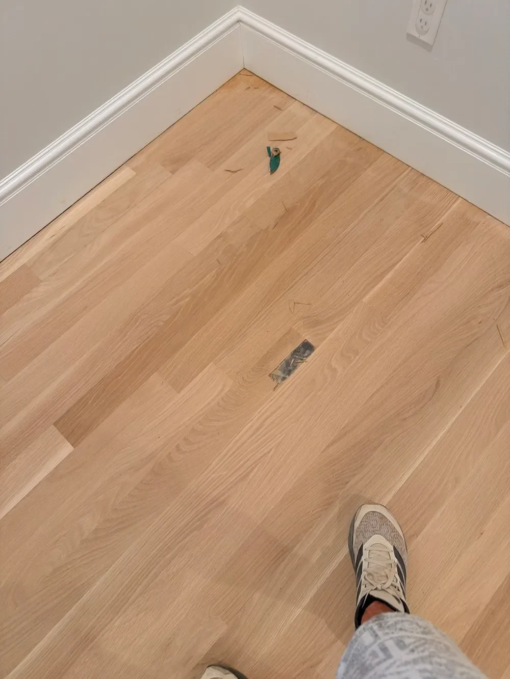 Damaged oak boards before localized repair