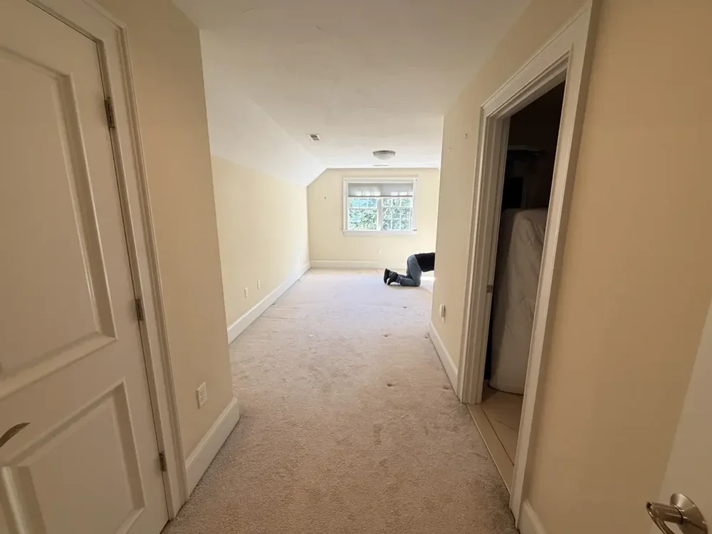 Hallway to the rear bedroom before the Wellesley flooring project