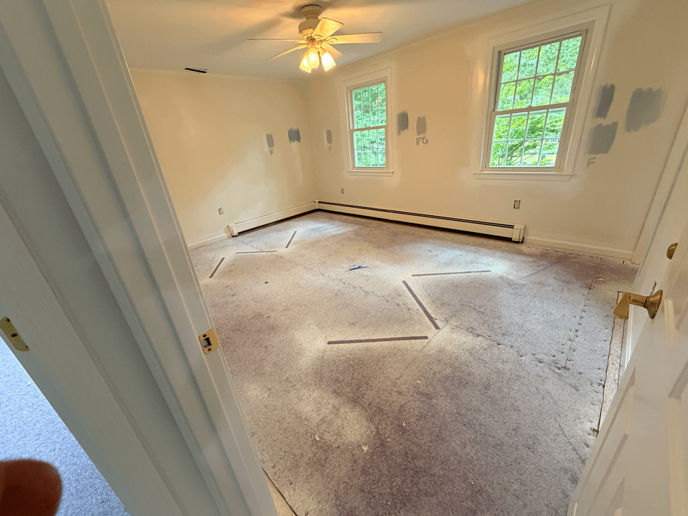 Andover first room with carpet before hardwood installation
