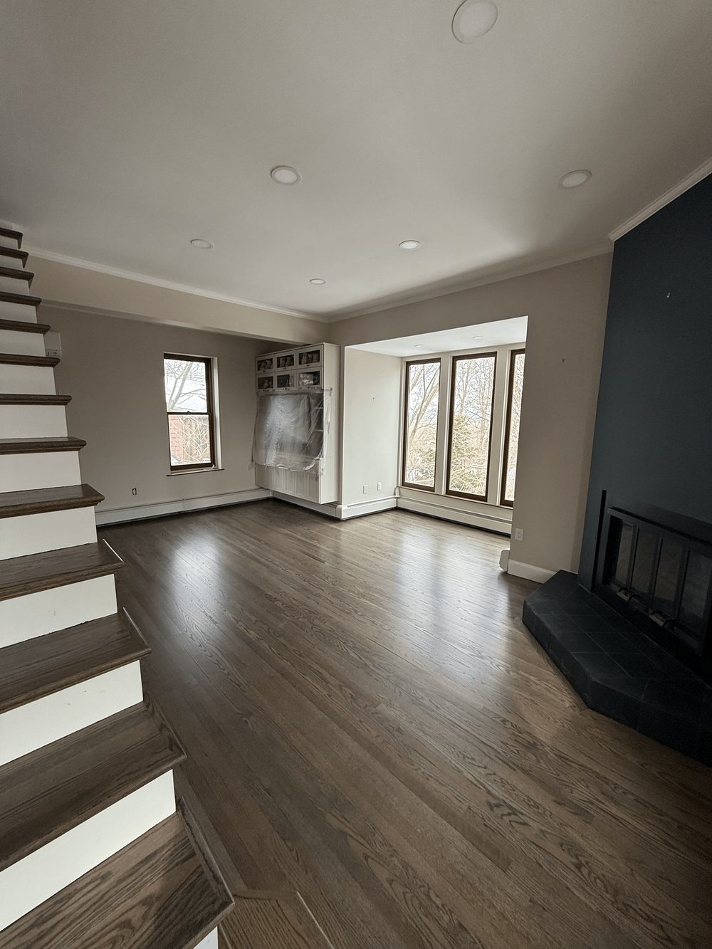 Hardwood floor samples showing different stain colors and finish sheens