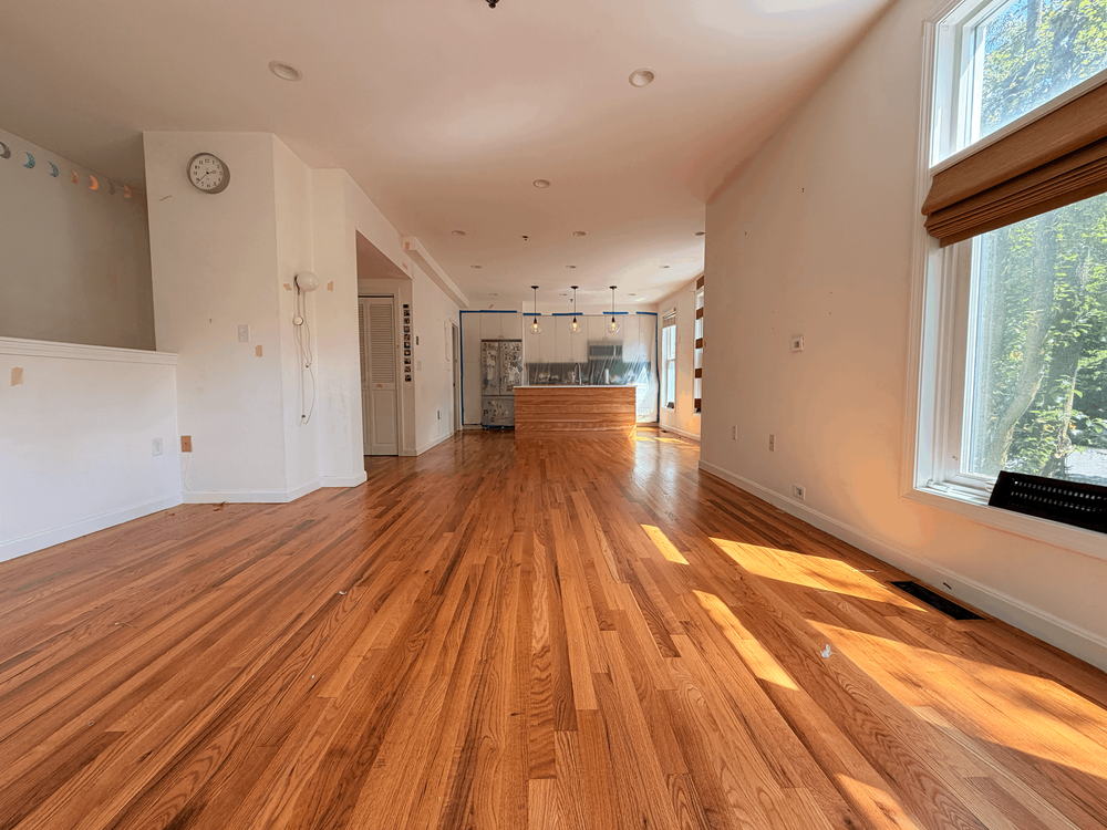 Cambridge living-to-kitchen view before refinishing