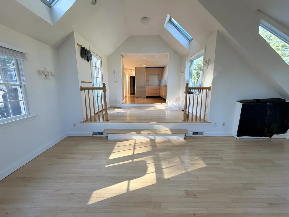 Sunroom before hardwood floor sanding and refinishing in Concord