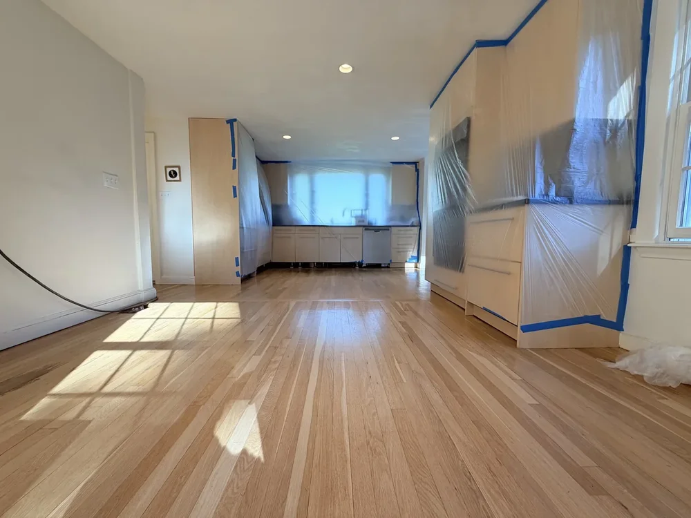 Kitchen before hardwood floor sanding and refinishing in Concord