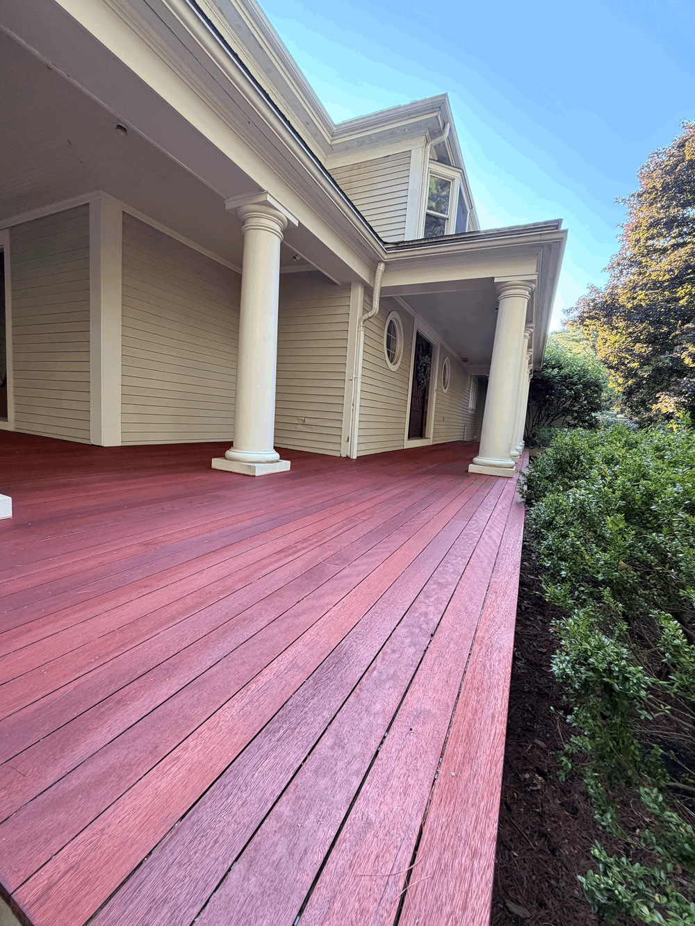 Finished mahogany porch in Sherborn after sanding and oil refinishing
