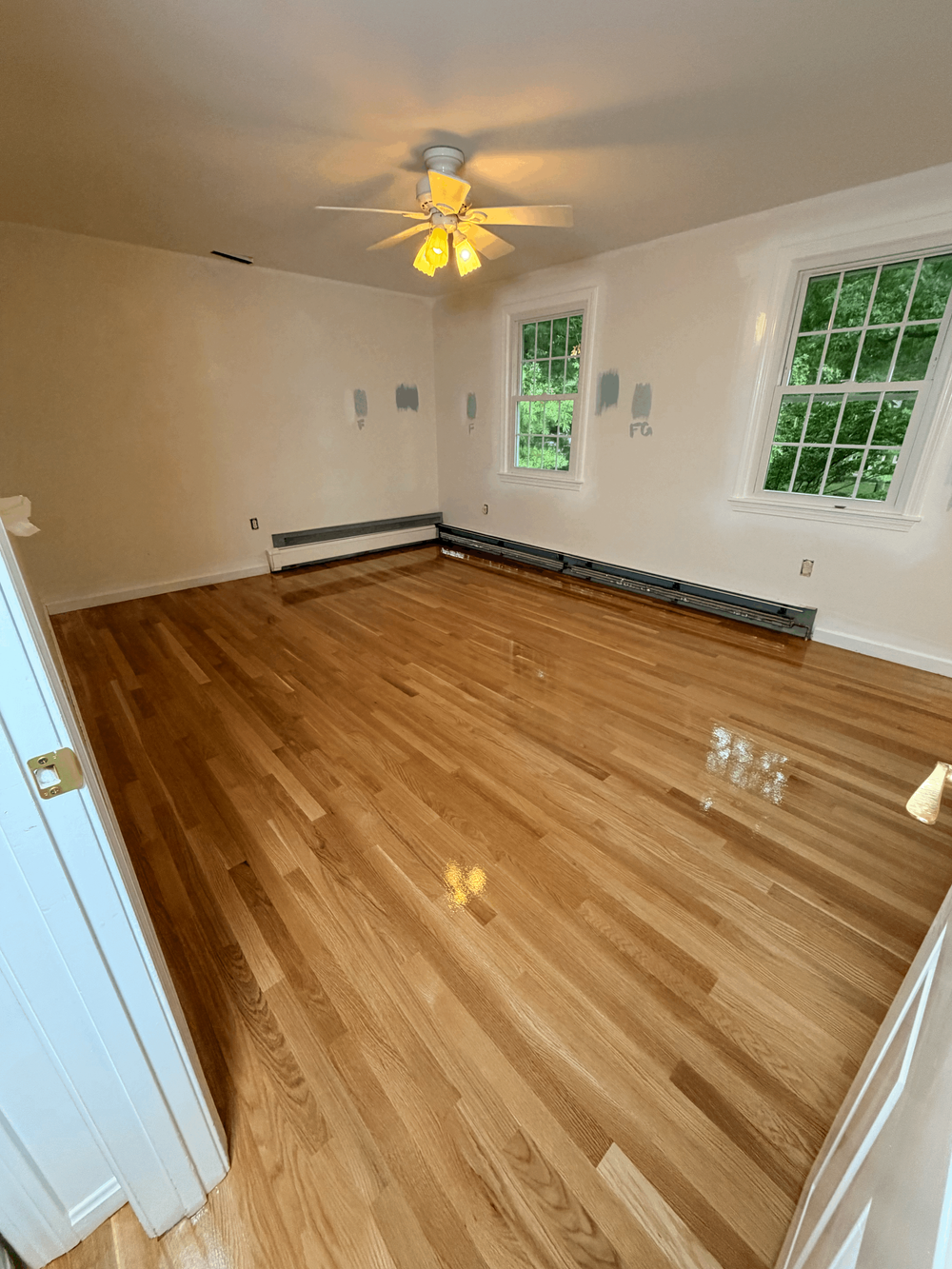 Completed site-finished white oak flooring in Andover