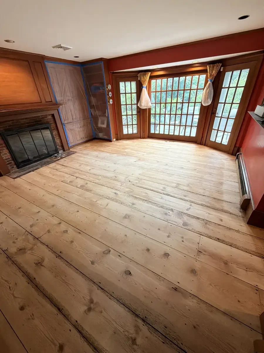 Paneled fireplace room before refinishing