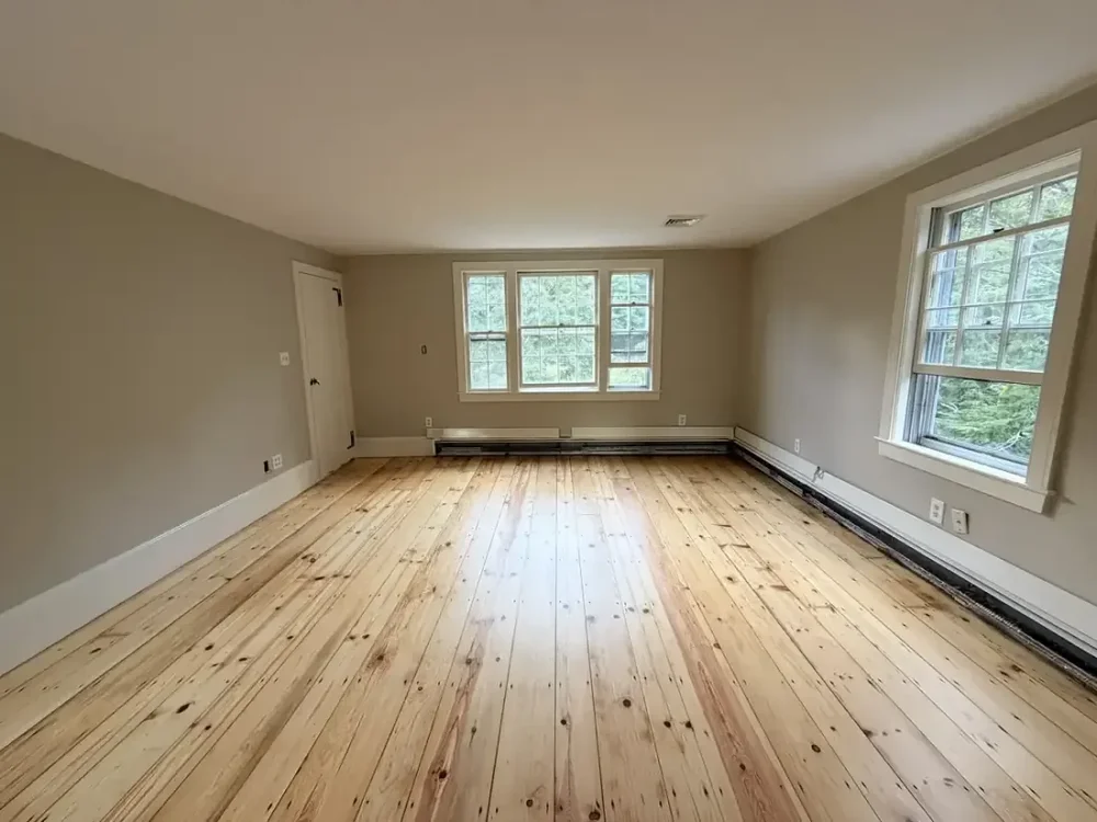 Weston upstairs room after hardwood floor refinishing