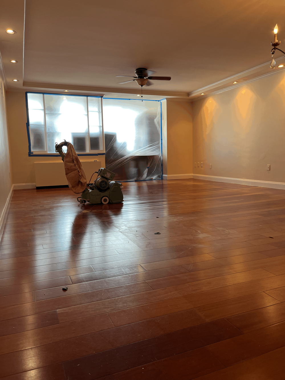 Professional operating hardwood floor sanding equipment
