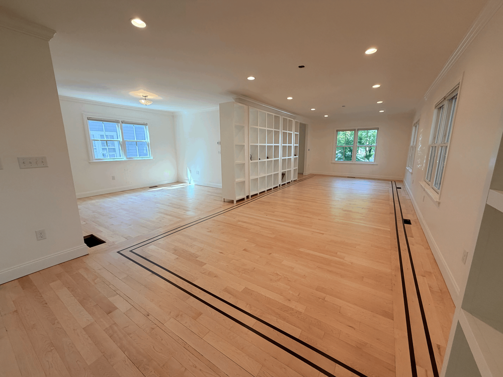 Bright living area after hardwood floor refinishing
