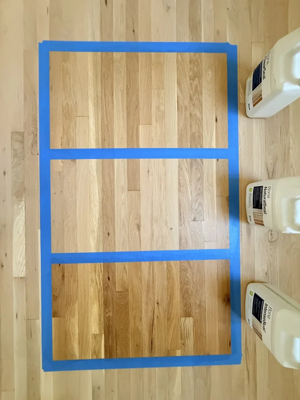 Bona sealer samples on the Cambridge floor, with NaturalSeal in the middle