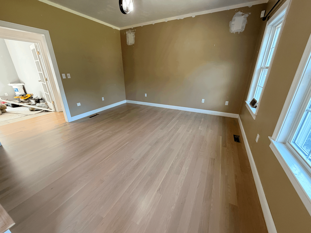 Newly refinished hardwood floor with a smooth natural finish