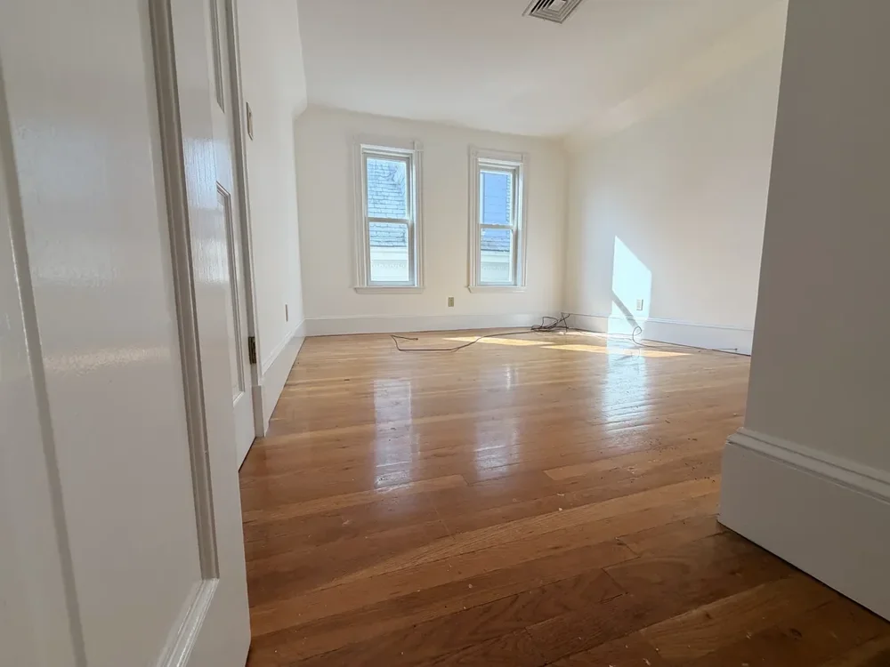 The two-window room before refinishing