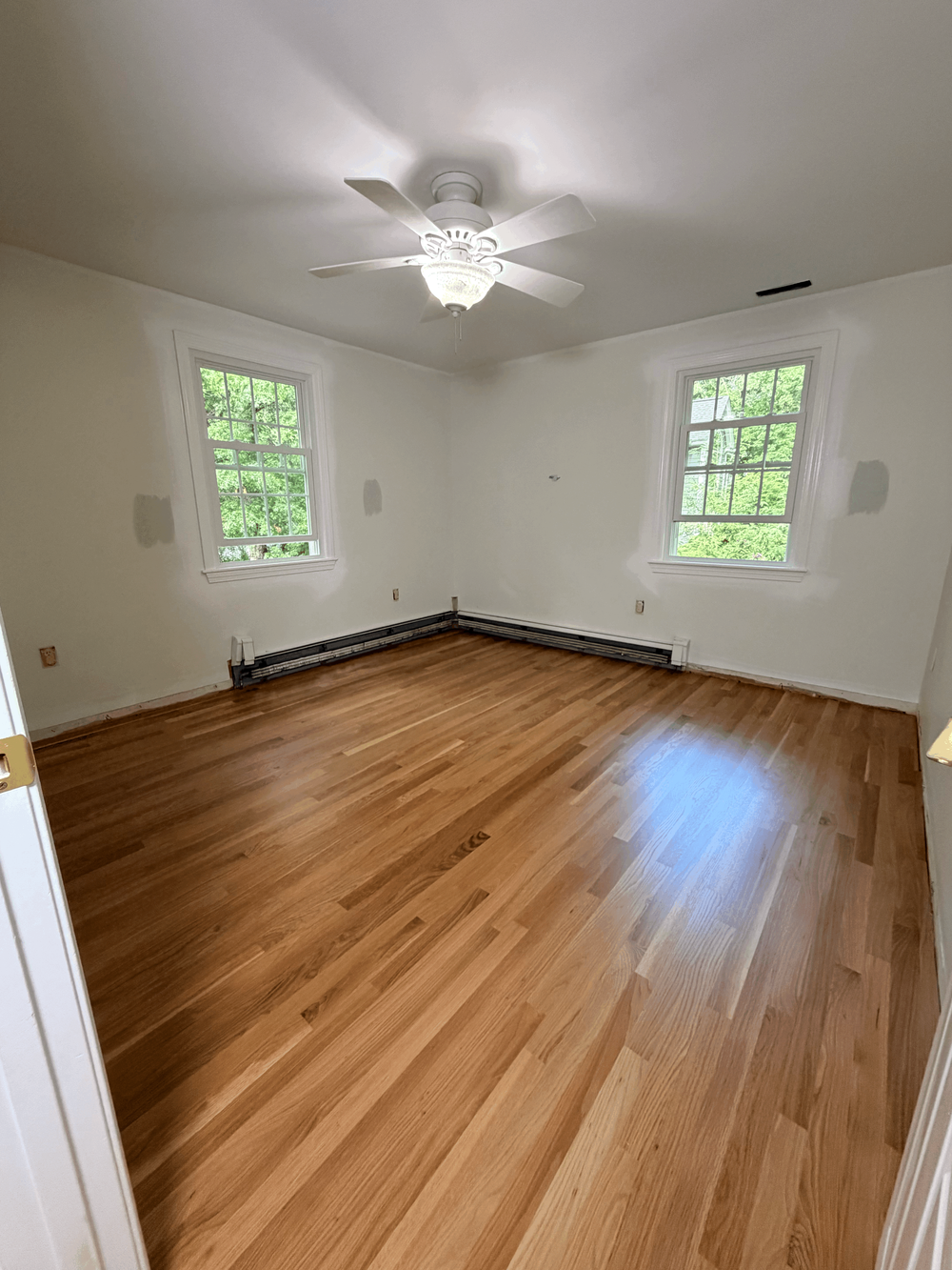 Finished white oak floor in the first Andover room
