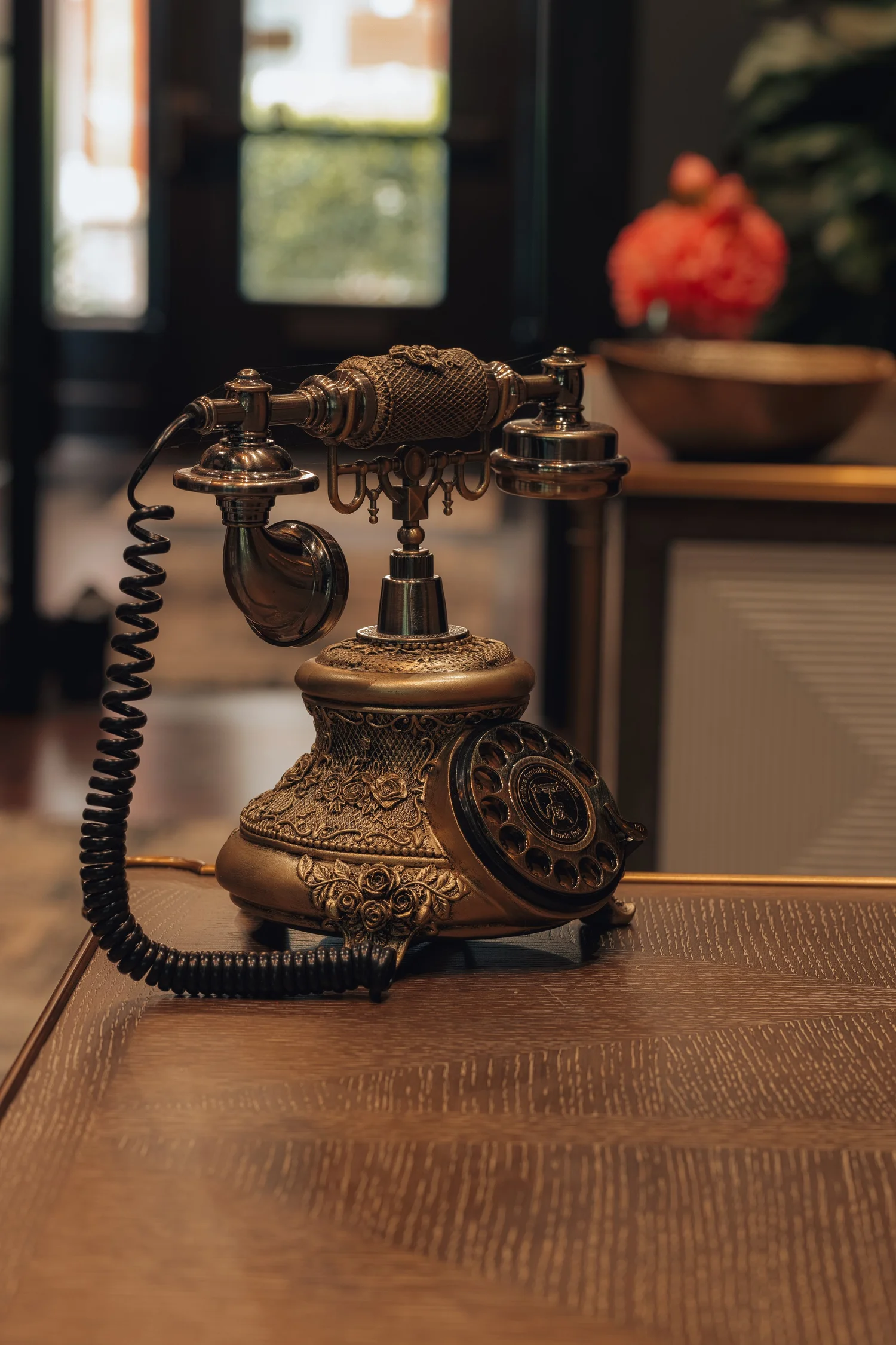 A vintage brass rotary telephone