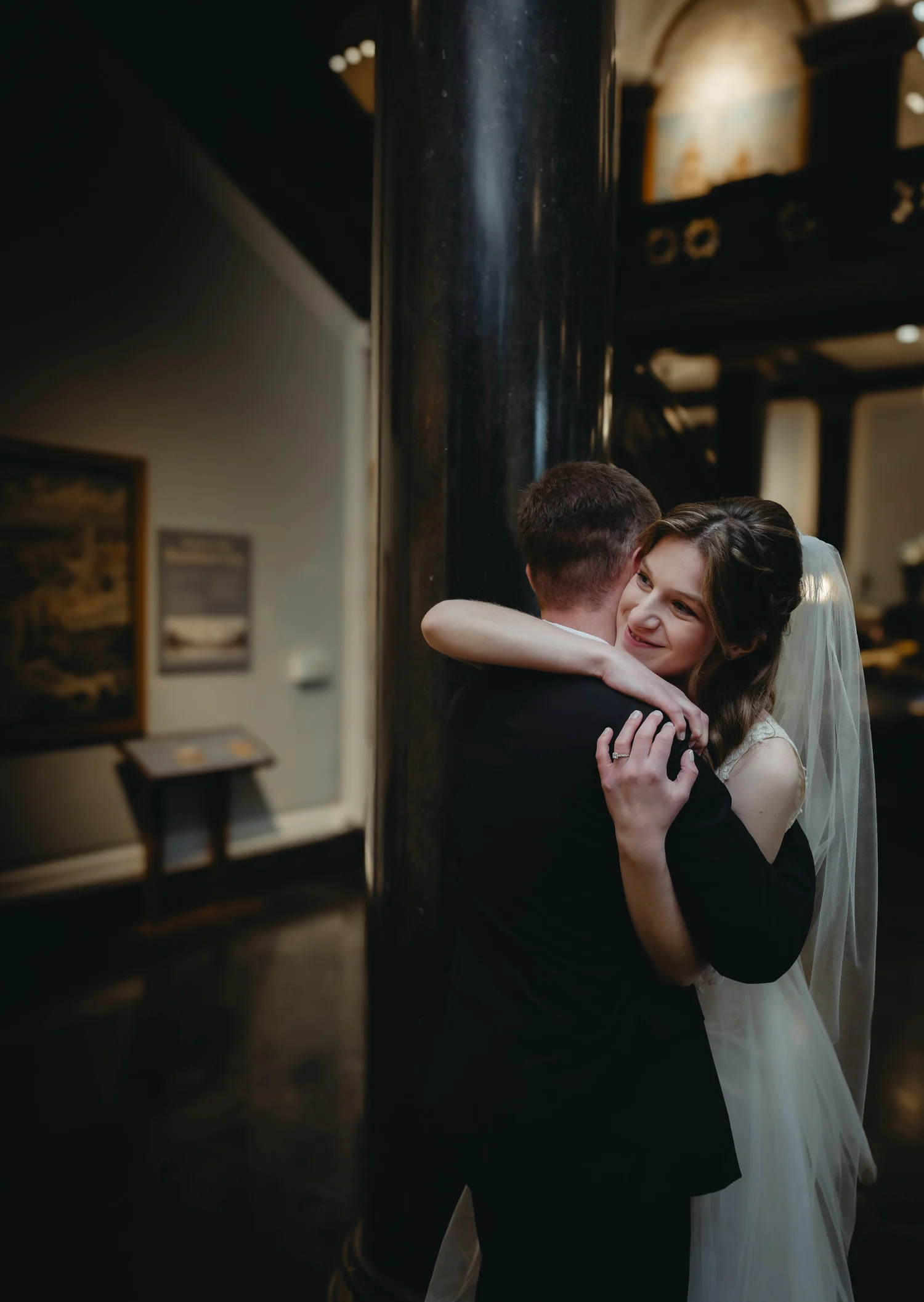 A bride hugging a guest