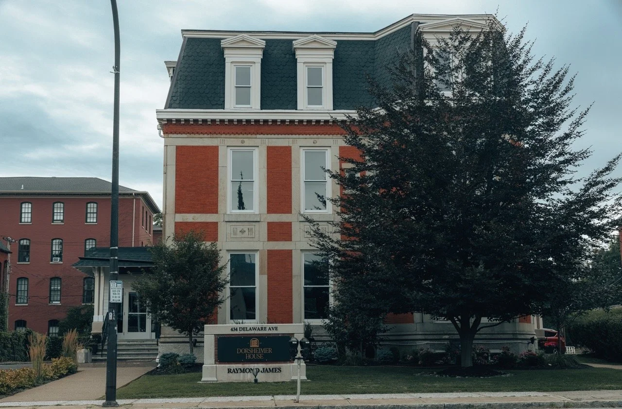 The brick facade and entrance of the building