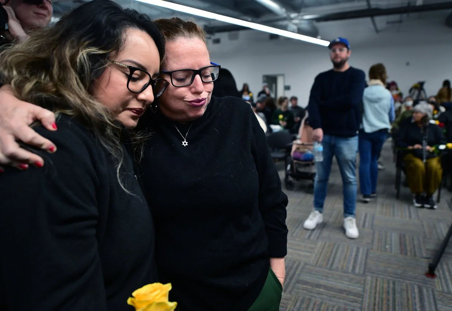 Two survivors embracing