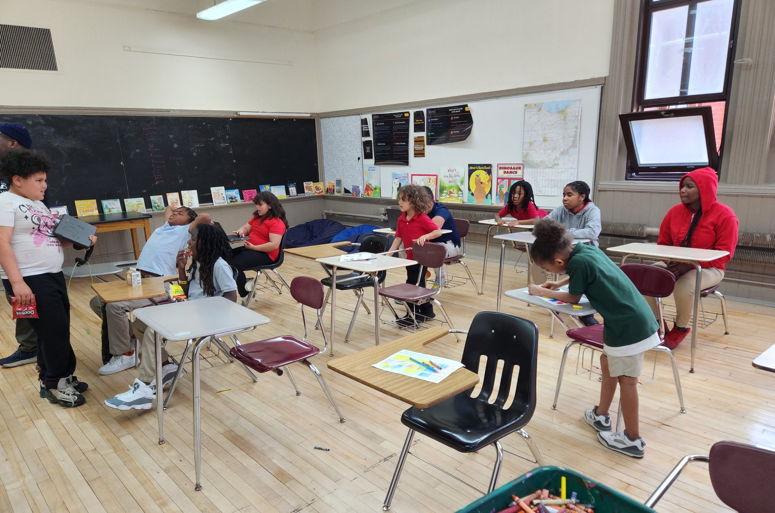 Students seated at desks during a classroom activity