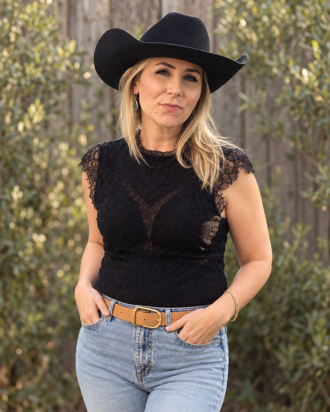 Aileen Savage, founder of NorCal Country Club, wearing a black cowboy hat