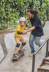 Learning to land a skateboard trick with a coach