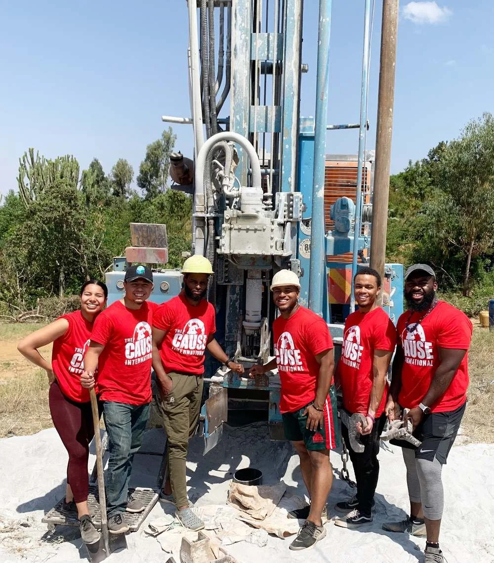 The Cause International team at the borehole drilling rig in Matchakos, Kenya