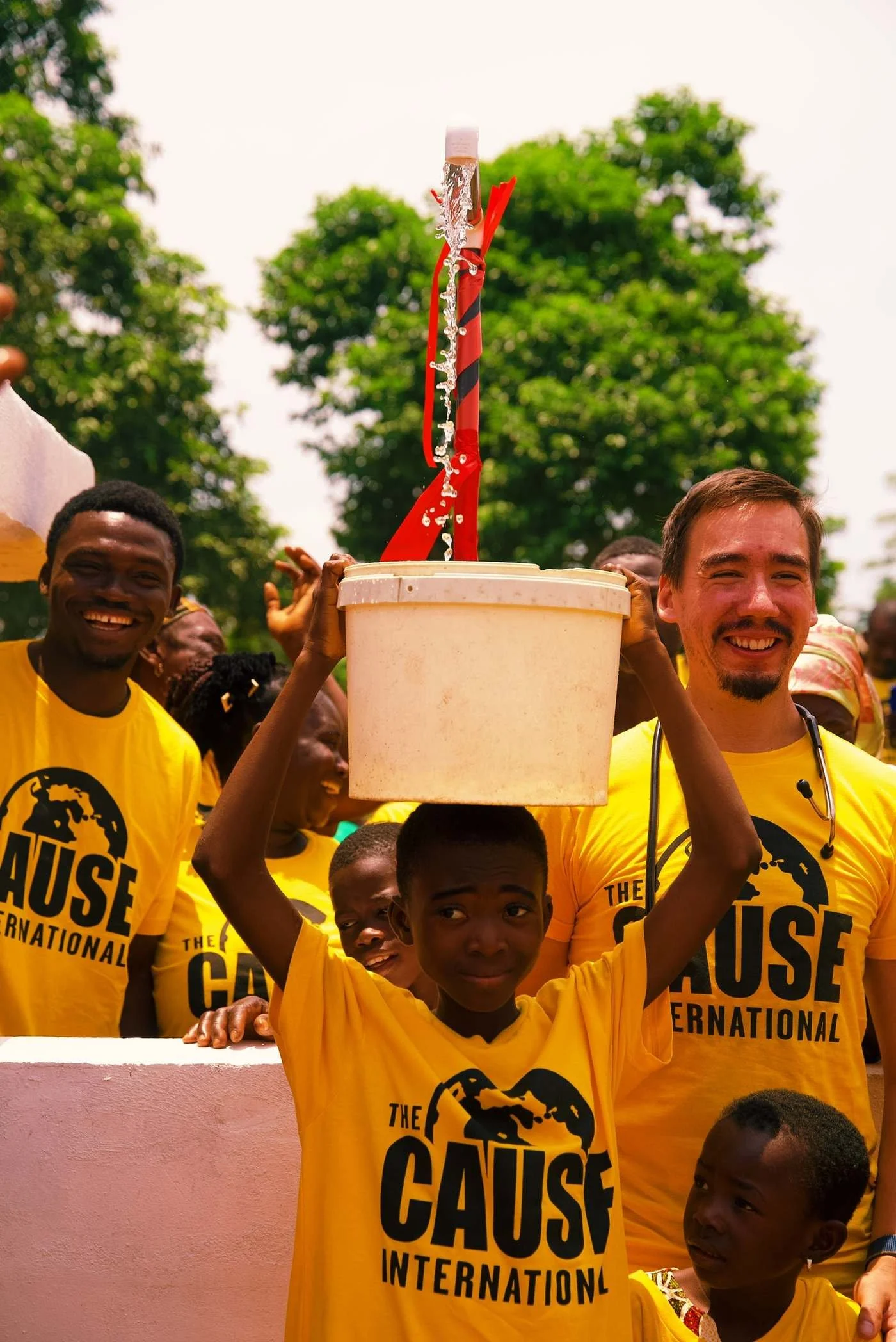 Clean water flowing from a newly opened borehole in Dwenantwi, Ghana
