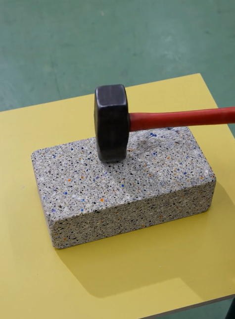 Hammer hitting Vetro sheet