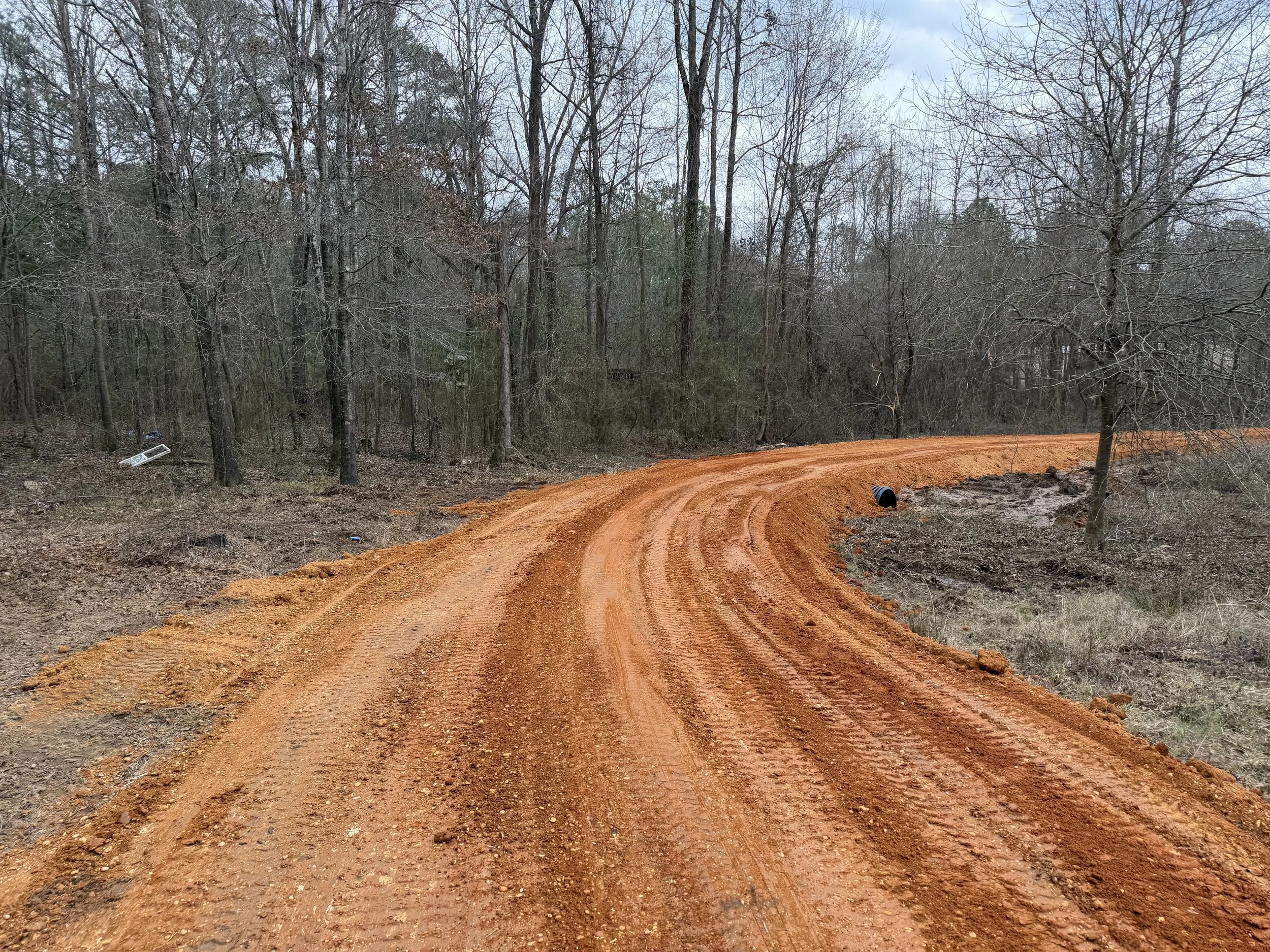 New access road crowned for drainage