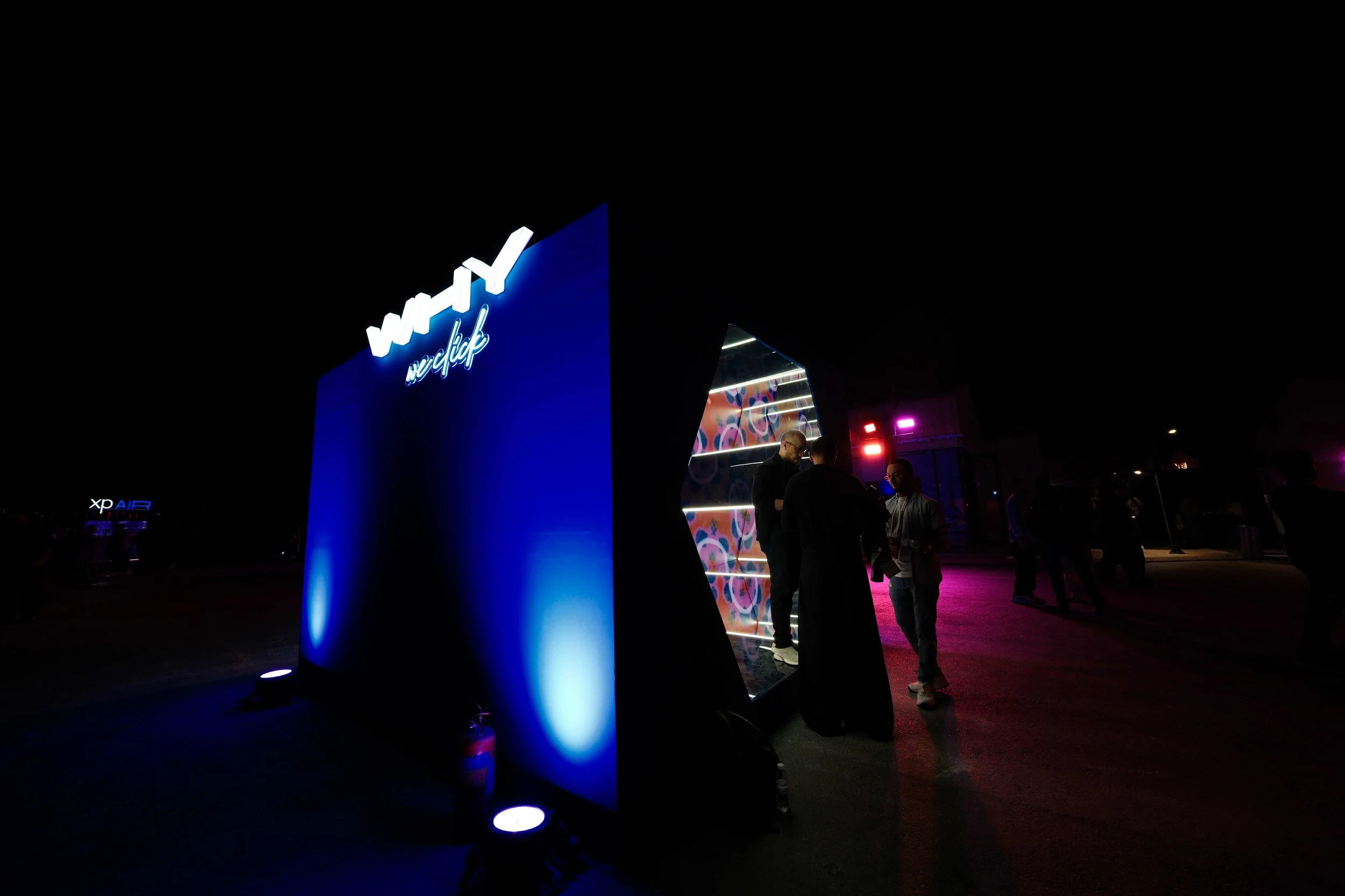 Why We Click booth at XP Music Futures at night