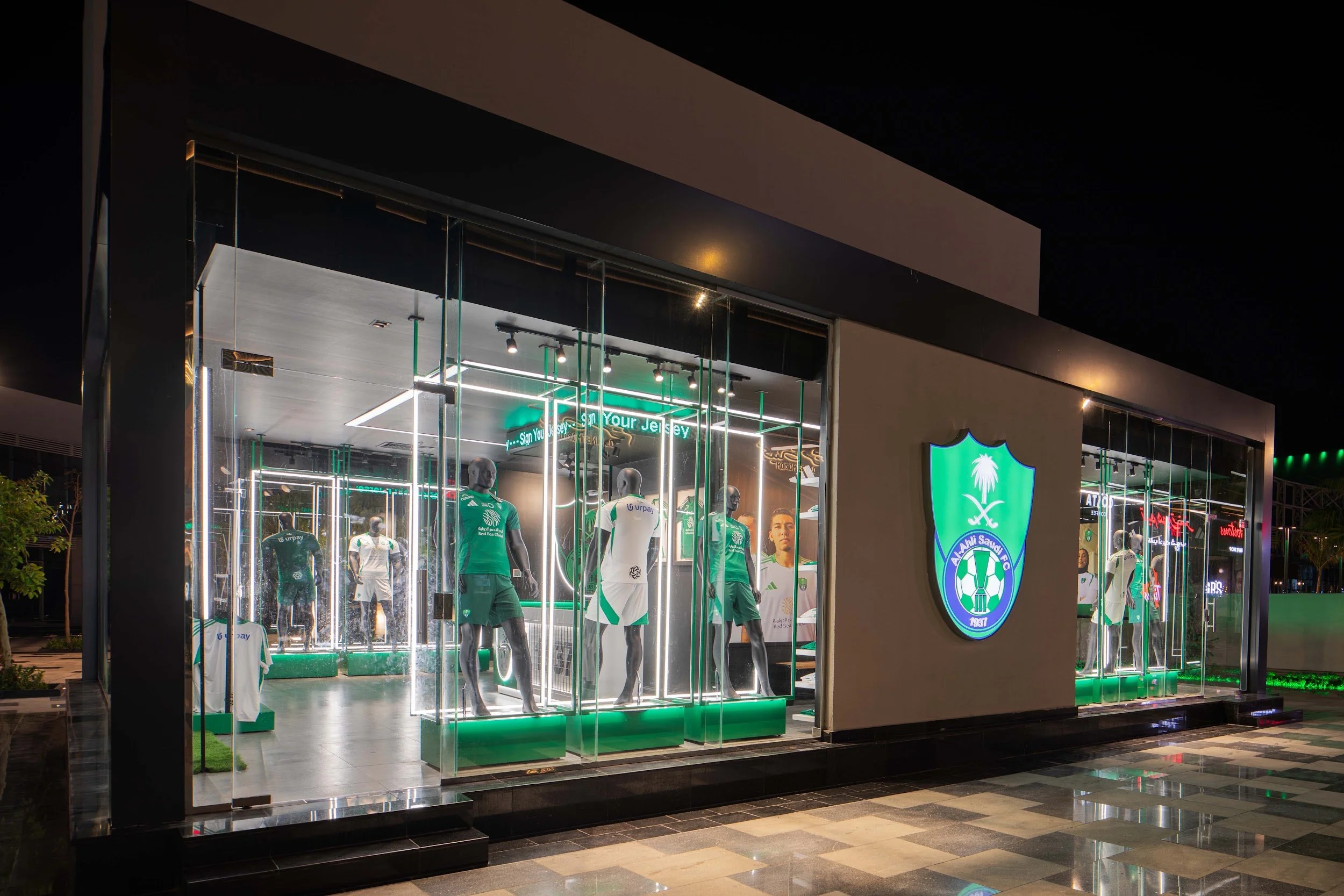 The Al Ahli × Adidas store in Jeddah at night