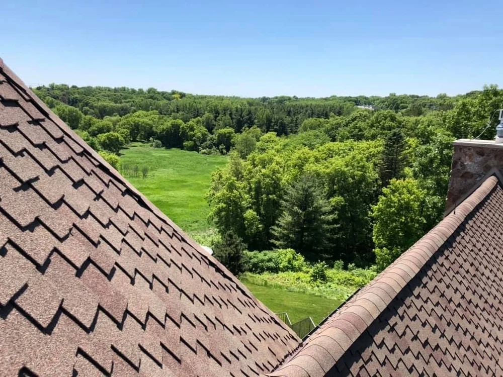 Finished roof overlooking a wooded valley