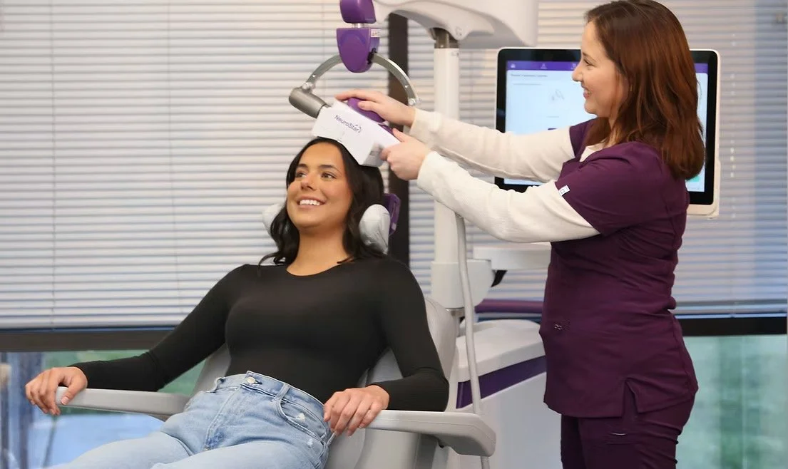 Clinician with a patient during a NeuroStar TMS therapy session at Redefine Mental Health & Wellness in Hastings, Minnesota