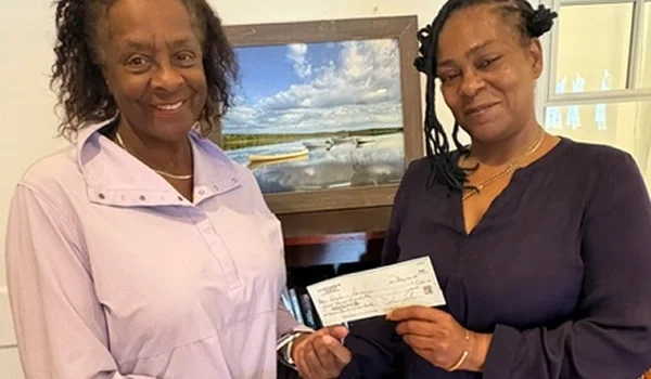Community members with donation check