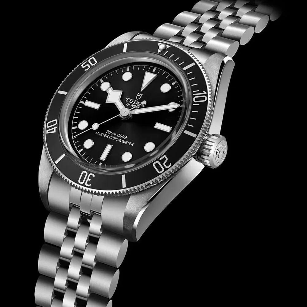 Front of the Tudor alumni watch with black dial and steel bracelet