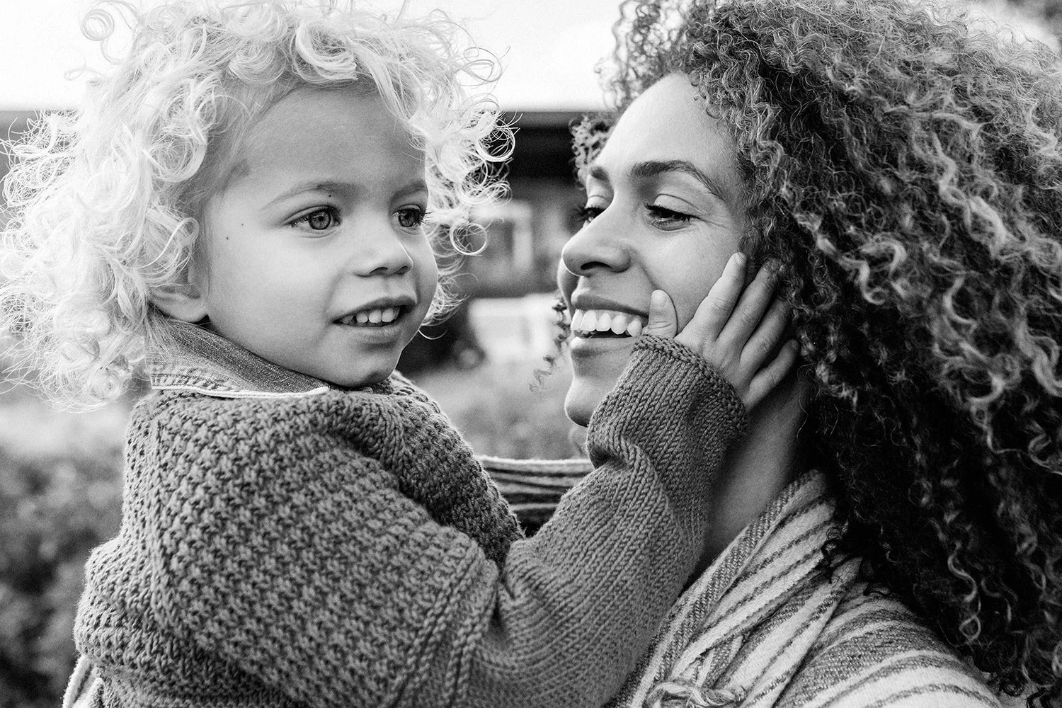 Black and white portrait of a mother and child