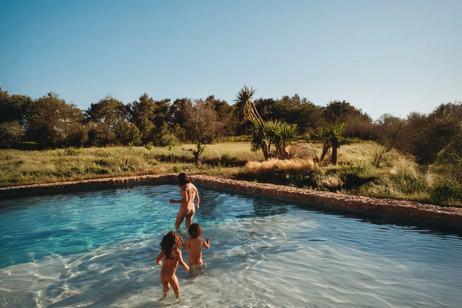 Maternity portrait in the water