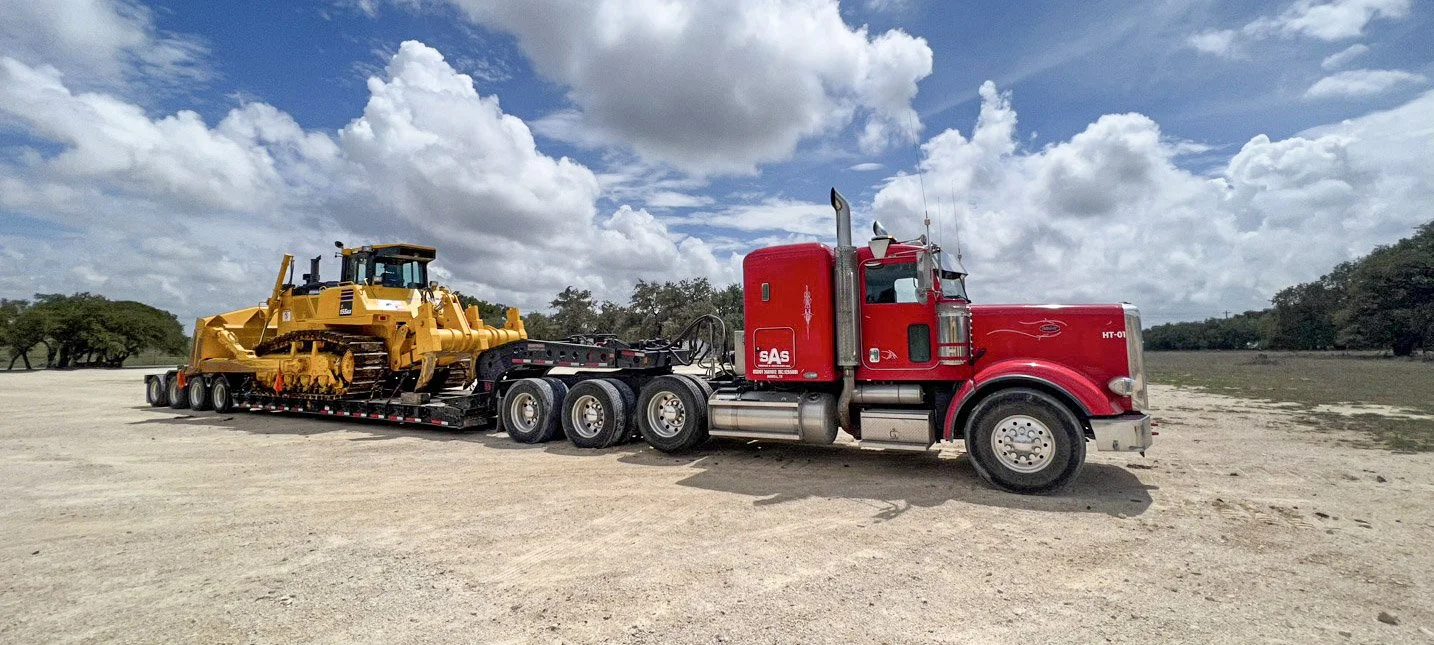 SAS Road Solutions heavy-haul truck transporting equipment in Central Texas