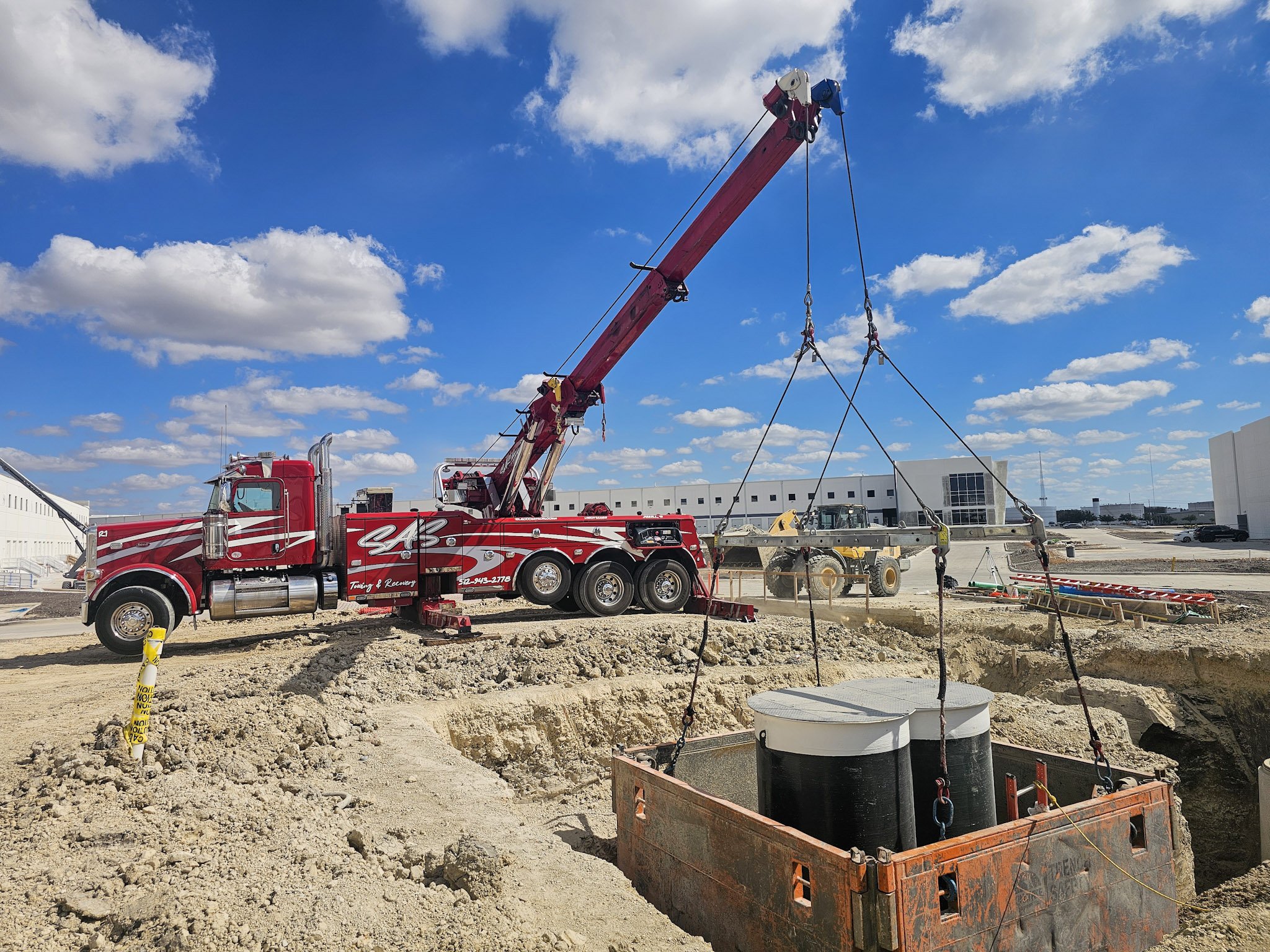 SAS Road Solutions mobile crane performing a controlled equipment lift
