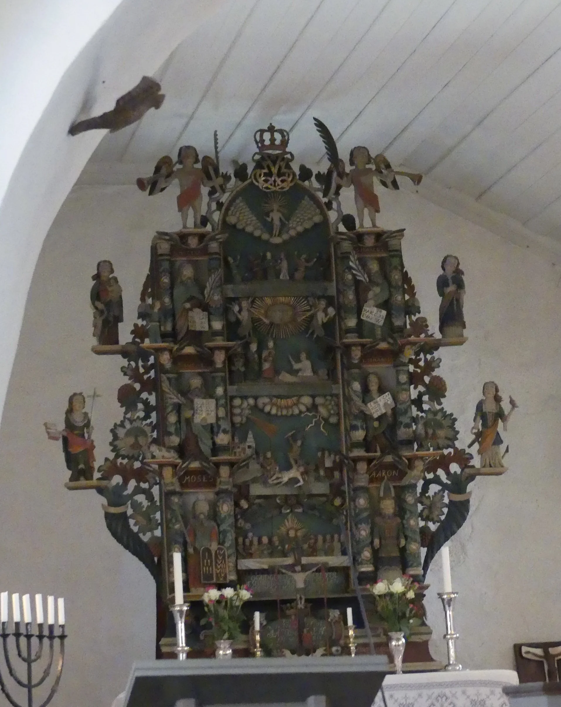 A carved altarpiece in an Ålesund church.