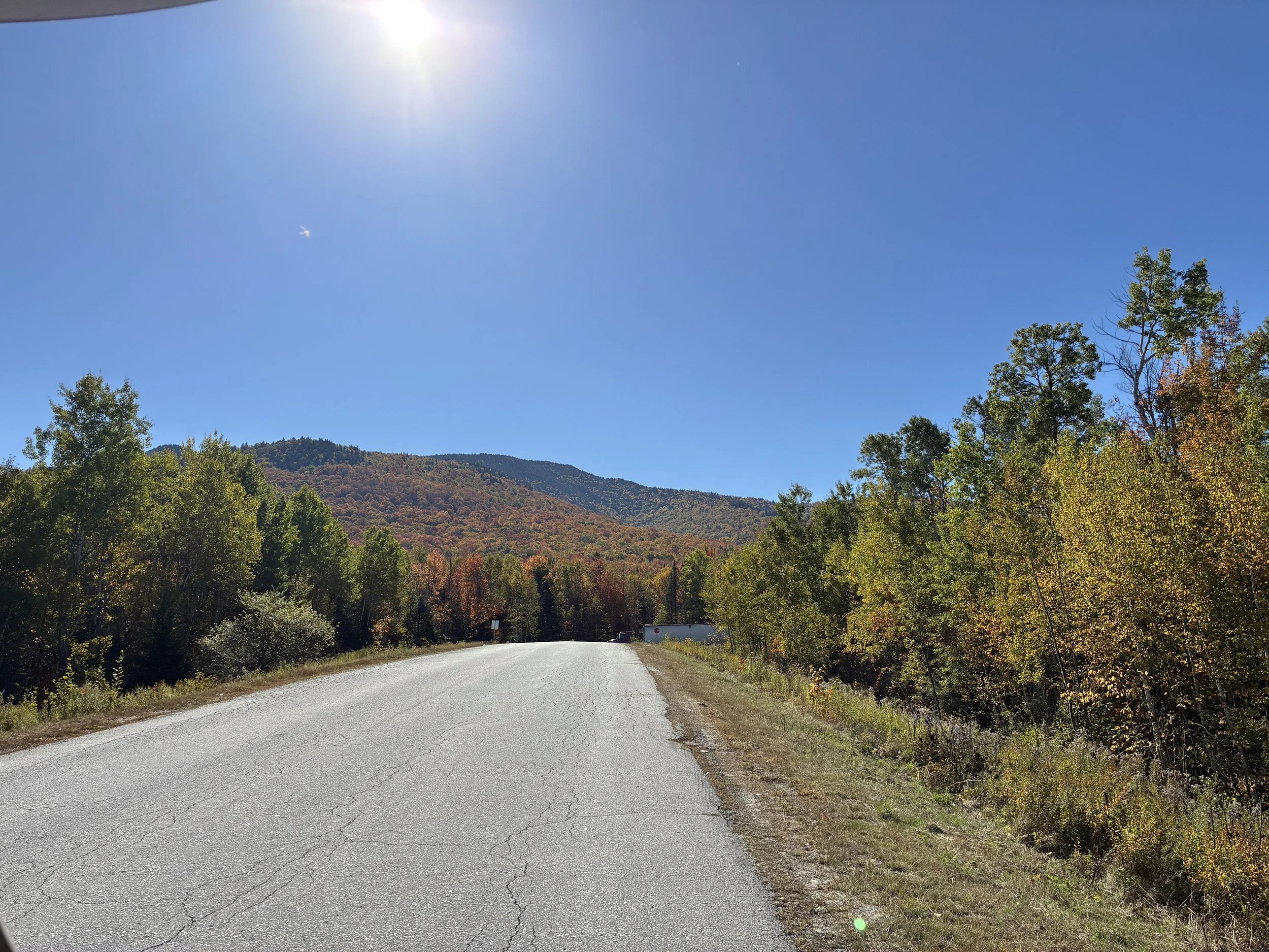 A road with a mountain view.