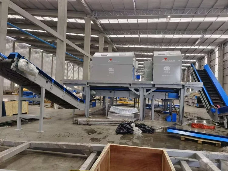 Conveyors and eddy current separators on a steel platform