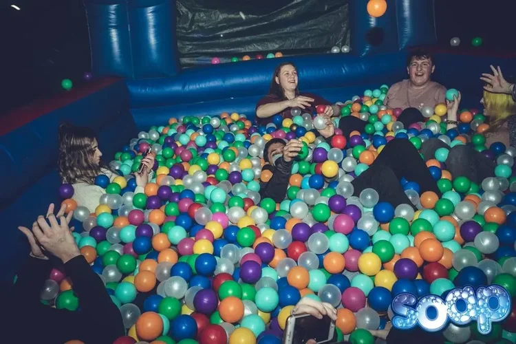 Room filled with multicoloured ball pit balls